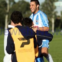 North Caulfield  V Peninsula Strikers. 17-4-11. Jubilation after scoring a goal. Photo: Peter Haskin
