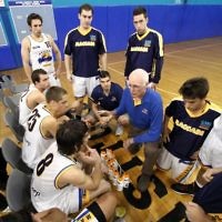 26-3-11. Maccabi Warriors Basketball vs Coburg. Coach Mike Slusher addessing players during time out. Photo: Peter Haskin