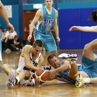 26-3-11. Maccabi Warriors Basketball vs Coburg.  Benji Tamir fighting for possesion. Photo: Peter Haskin