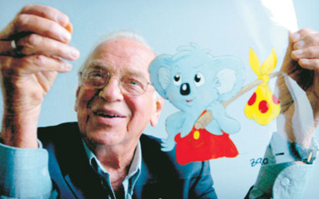 Yoram Gross with one of his animated cells of Blinky Bill.