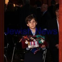 13-12-11. Memeorial service for former Australian Governer General, Sir Zelman Cowen. Held at Temple Beth Israel, Alma Rd., East St Kilda. Mitch Cowen, Grandson of Sir Zelman leads the coffin out carrying his grand father's medals. Photo copyright: AJN/Peter Haskin.