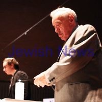 Yom Hashoah 2012. Robert Blackwood Hall, Monash University. Herschel Balter lighting a memorial candle. Photo: Peter Haskin