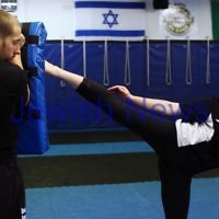 11-6-12. Krav Maga instructor Melinda Slonim warming up before taking a women's session. Photo: Peter Haskin 11-6-12. Krav Maga instructor Melinda Slonim warming up before taking a women's session. Photo: Peter Haskin