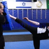 11-6-12. Krav Maga instructor Melinda Slonim warming up before taking a women's session. Photo: Peter Haskin 11-6-12. Krav Maga instructor Melinda Slonim warming up before taking a women's session. Photo: Peter Haskin