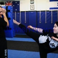 11-6-12. Krav Maga instructor Melinda Slonim warming up before taking a women's session. Photo: Peter Haskin 11-6-12. Krav Maga instructor Melinda Slonim warming up before taking a women's session. Photo: Peter Haskin