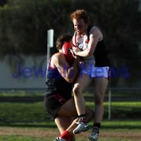 21-7-212. AJAX v Old Brighton at Brighton Beach Oval. Jesse Osowicki lays a bump. hoto: Peter Haskin 21-7-212. AJAX v Old Brighton at Brighton Beach Oval. Jesse Osowicki lays a bump. hoto: Peter Haskin