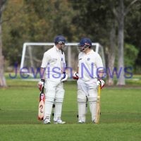13-10-12. Maccabi Cricket v Powerhouse. Dean Weiner (left) chats with Mark Soffer between overs. Photo: Peter Haskin