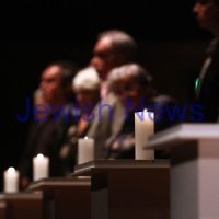 18-4-12. Yom Ha Shoah, Robert Blackwood Hall, Monash University. Lighting of the 6 memorial candles.  Photo: Peter Haskin
