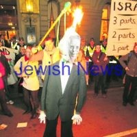 As Ted Baillieu attended a Yom Ha’atzmaut reception in Melbourne, anti-Israel protestors outsidescreamed abuse, called for the destruction of the Jewish State and burned an effigy of the Premier. Photo: peter haskin
