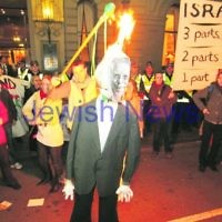 As Ted Baillieu attended a Yom Ha’atzmaut reception in Melbourne, anti-Israel protestors outsidescreamed abuse, called for the destruction of the Jewish State and burned an effigy of the Premier. Photo: peter haskin