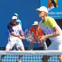 Australian Open 2013. Round 1, Mens Doubles.  Jonathan Erlich (ISR) / Kevin Anderson (RSA) def 2nd seeds Leander Paes (IND) / Radek Spepanik (CZE)  6-3 7-5.  Photo: Peter Haskin