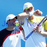 Australian Open 2013. Round 2, Mens Doubles.  Jonathan Erlich (ISR) / Kevin Anderson (RSA) def Matthew barton (AUS / John Millman (AUS) 6-1 6-7 6-3 Photo: Peter Haskin