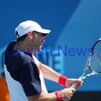 Australian Open 2013. Round 2, Mens Doubles.  Jonathan Erlich (ISR) / Kevin Anderson (RSA) def Matthew barton (AUS / John Millman (AUS) 6-1 6-7 6-3 Photo: Peter Haskin
