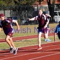 jnr carnival 2013. Qld passing the baton in the relay. Sydney. photo: Henry benjamin. jnr carnival 2013. Qld passing the baton in the relay. Sydney. photo: Henry benjamin.