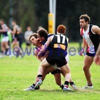 24-8-13. AJAX defeated Caulfield Grammarians by 73 points in the final match of the season. Gary Blieden being tackled. Photo: Peter Haskin 24-8-13. AJAX defeated Caulfield Grammarians by 73 points in the final match of the season. Gary Blieden being tackled. Photo: Peter Haskin