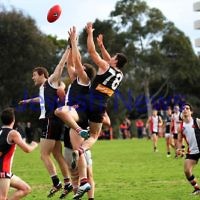 24-8-13. AJAX defeated Caulfield Grammarians by 73 points in the final match of the season. Jake Lew, Jason Seidle and Eugene Routman fly for a mark. Photo: Peter Haskin 24-8-13. AJAX defeated Caulfield Grammarians by 73 points in the final match of the season. Jake Lew, Jason Seidle and Eugene Routman fly for a mark. Photo: Peter Haskin