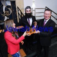 12-8-13. Hamerkaz Centre. Victorian Premier Dr Denis Napthine visits the new Centre to officially open the Lamdeni School. Dina and Rabbi Motty Liberow present the Premier with a shofar. Photo: Peter Haskin 12-8-13. Hamerkaz Centre. Victorian Premier Dr Denis Napthine visits the new Centre to officially open the Lamdeni School. Dina and Rabbi Motty Liberow present the Premier with a shofar. Photo: Peter Haskin