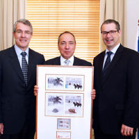 10-5-13. Launch of Israel-Australia stamp at Treasury Place, Melbourne. From left: Mark Dreyfus, Israeli ambassador Yuval Rotem, Minister Stephen Conroy.. Photo:Peter Haskin