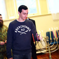 5-12-13. Last day of Chanukah. East Melbourne Hebrew Congregation. Rabbi David Gutnick, Jewish Chaplain with the Australian Defense Force, organised a candle lighting ceremony incorporating members of the ADF and guests that included Felix and Yvonne Sher, parents of Private Greg Sher who was killed in Afganistran.  Photo: Peter Haskin