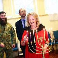 5-12-13. Last day of Chanukah. East Melbourne Hebrew Congregation. Rabbi David Gutnick, Jewish Chaplain with the Australian Defense Force, organised a candle lighting ceremony incorporating members of the ADF and guests that included Felix and Yvonne Sher, parents of Private Greg Sher who was killed in Afganistran.  Helen Brustman. Photo: Peter Haskin