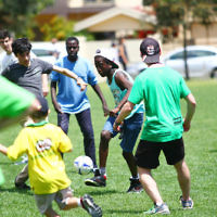 17-11-13. Mitzvah Day 2013. Jewish Aid Australia co ordinated many activities at Caulfield Park with the Sudanese community . Photo: Peter Haskin
