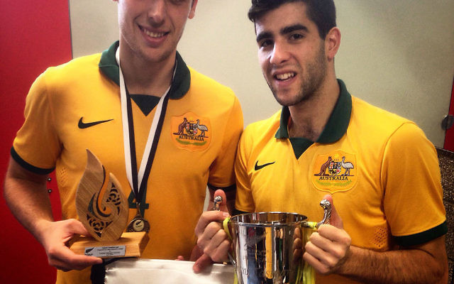 Futsalroo teammates, Trans-Tasman MVP Jordan Mundell (left) and Jarrod Basger,
holding the series cup.