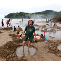 Evelyn Flitman gets into some hot water at Hot Water Beach on the North Island of New Zealand.