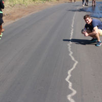 Steven Curtis  entered this photo of Ash with a road line painting in Zambia in July 2014.