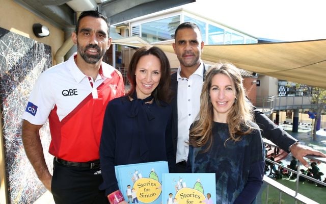 Stories For Simon Book launch. Author Lisa Sarzin and illustrator Lauren Briggs pictured withSwans AFL players Adam Goodes and Michael O’Loughlin.