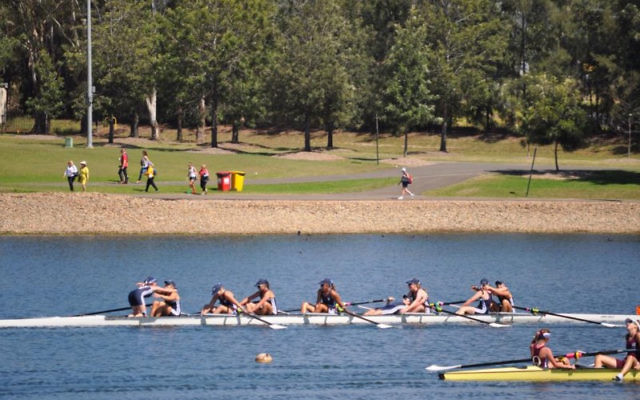 Sarah Ben-David (far left) hugs her teammate after victory at the 2015 Australian Rowing Championships.