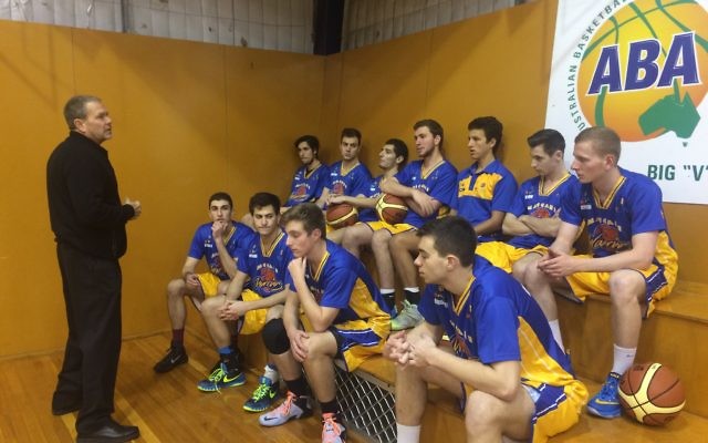 Coach Al Westover addresses the Maccabi Warriors youth team.