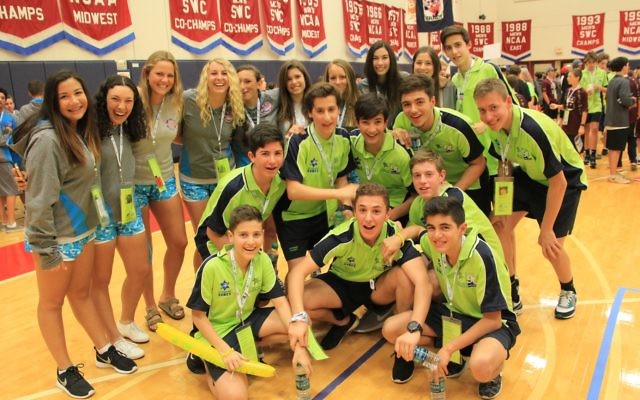Maccabi Australia’s Under-14 basketball team at the JCC opening ceremony with some American girls. Photo: Michelle Israel
