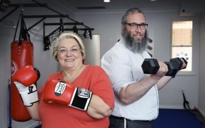 Sally Betts and Rabbi Mendel Kastel are ready for the Fitness and Weight Loss Community Challenge. Photo: Noel Kessel
