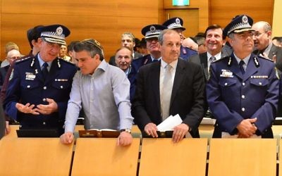 NSW Police Commissioner Andrew Scipione chats to Central Synagogue president Danny Taibel, alongside NSW Jewish Board of Deputies CEO Vic Alhadeff, and Deputy Commissioner Nick Kaldas. 
Photo: Henry Benjamin