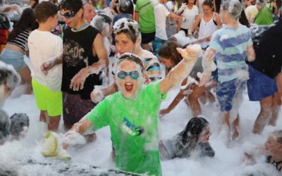 Enjoying the Junior Carnival foam party. Photo: Jessica Cohen