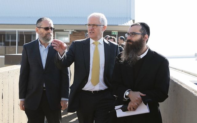 Rabbi Noteh Glogauer (right) pictured with KTC president Meir Moss (left) and Prime Minister Malcolm Turnbull.