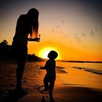 Mark Howard entered this photo of his wife and son taken at sunset on Noosa main beach in June 2015.