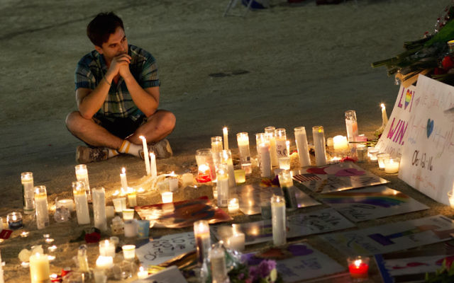 A makeshift memorial for victims of the Pulse nightclub.
Photo: AP Photo/David Goldman.