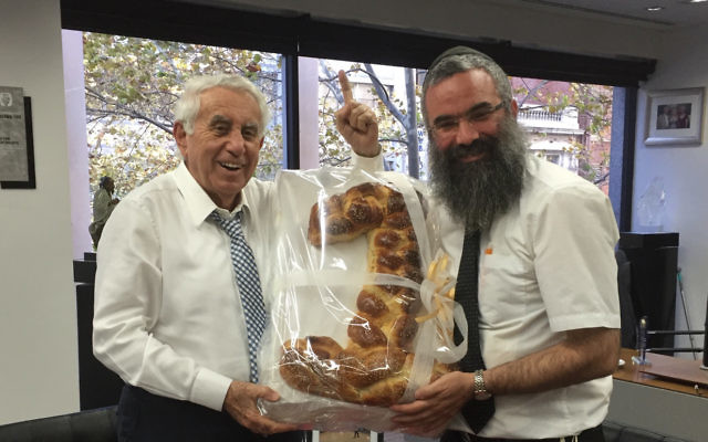 Our Big Kitchen’s Rabbi Dovid Slavin took a large challah in the shape of the number one to Harry Triguboff when he was named the richest person in Australia.