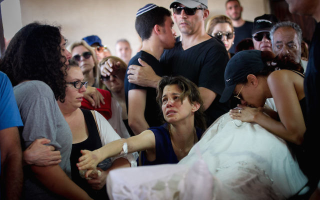 Family and friends mourning at the funeral ceremony of Ido Ben Ari.
Photo: Miriam Alster/Flash90/JTA.