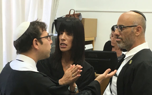 Prosecutor Matan Akiva argues with Leifer's defence lawyers Yehuda Fried and Adi Niv in court. Photo: Nathan Jeffay.