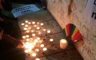 Lighting candles in Zion Square in memory of the Orlando victims.