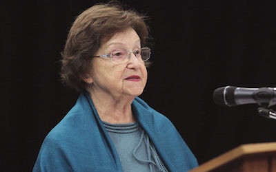Holocaust survivor Guta Goldstein reads an excerpt from her book, There Will Be Tomorrow, the harrowing story of her survival of the Lodz Ghetto, Auschwitz and other camps during World War II to Macleans College students.