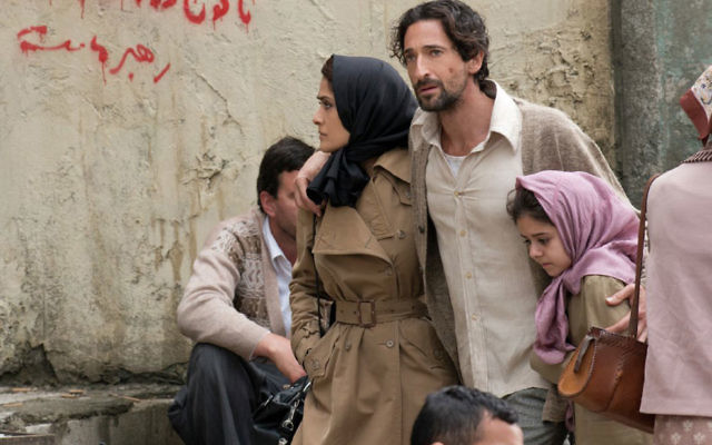 Isaac Amin (Adrien Brody), his wife Farnez (Salma Hayek) and daughter in Septembers of Shiraz.