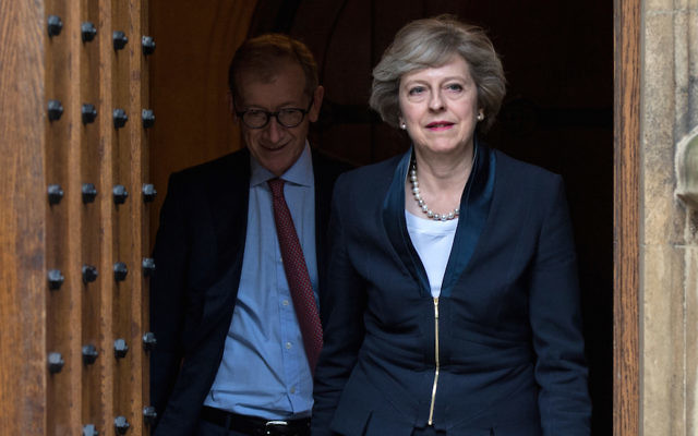 Britain's Prime Minister Theresa May, with her husband Philip. The British government is set to adopt a new definition of anti-Semitism. Photo: Chris Ratcliffe/AFP/Getty Images