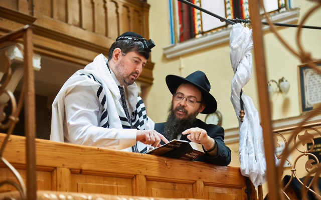 Former right-wing politician Csanad Szegedi in a synagogue with Rabbi Boruch Oberlander in Keep Quiet.