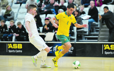 from left Futsal Whites' Josh Margetts and Futsal Roos's Jarrod Basger in action during the ASB Trans Tasman Cup - Futsal Whites v Futsal Roos at ASB Sports Centre, Wellington, New Zealand on Friday 10 July 2015.
Photo : Masanori Udagawa / www.photosport.nz