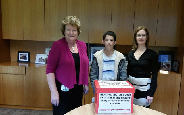Sydney's Gidon Goodman, 13, presents his petition for hospital parking fee regulation to NSW Health Minister Jillian Skinner with Vaucluse MP Gabrielle Upton at NSW Parliament House on October 11.