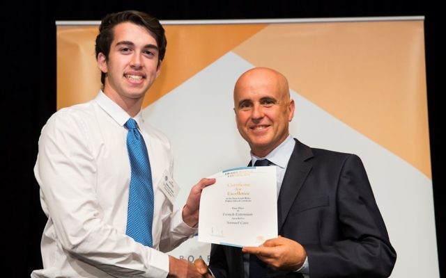 Sydney Grammar School HSC graduate Sam Cass receiving his First in Course certificate (for French Extension) from NSW Education Minister Adrian Piccoli.