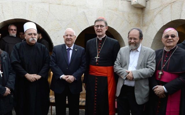 Israel's president Reuven Rivlin joined leaders from different faiths at the reopening of the vandalised church in the Galilee.